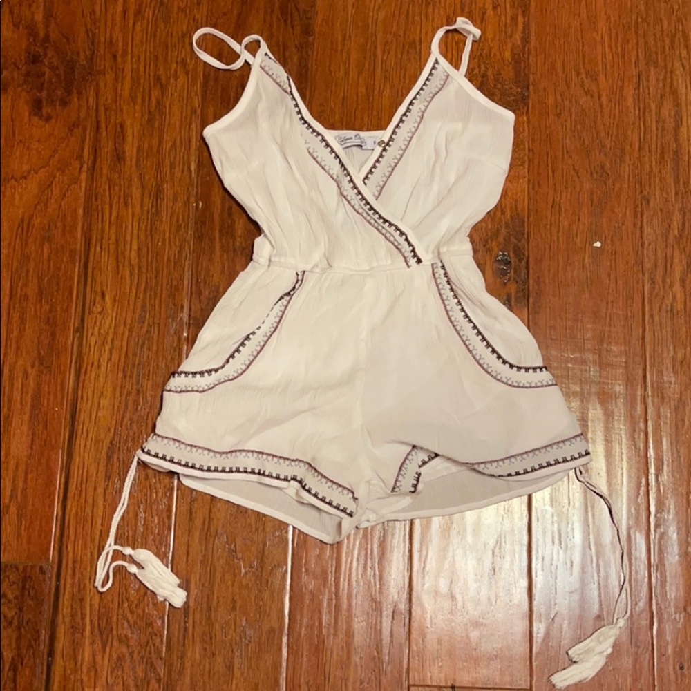 White one piece with designs